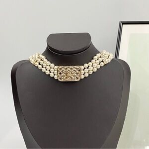 CHANEL Pearl Necklace with Gold Accent